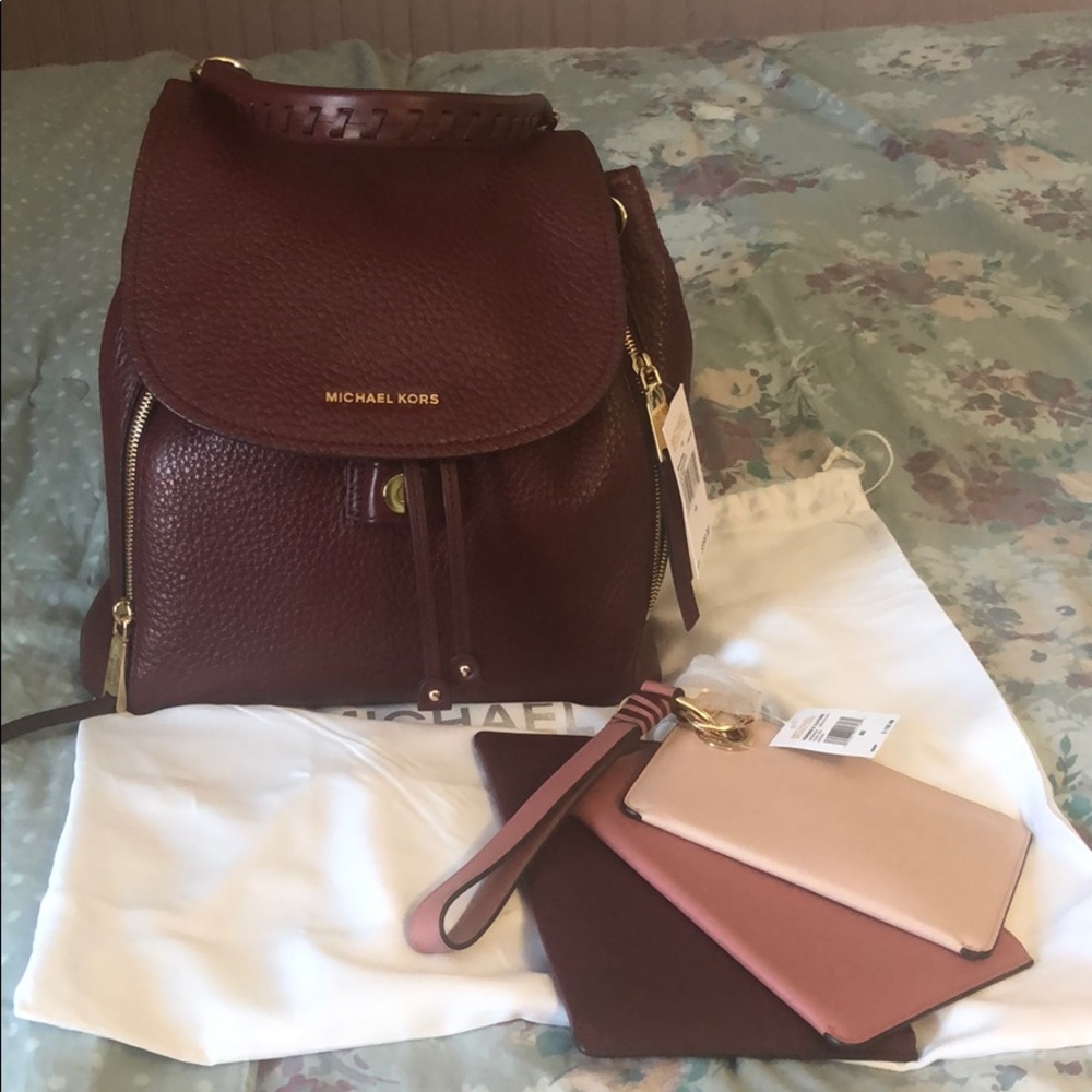 Michael Kors Vivienne and Tri color leather pouch
